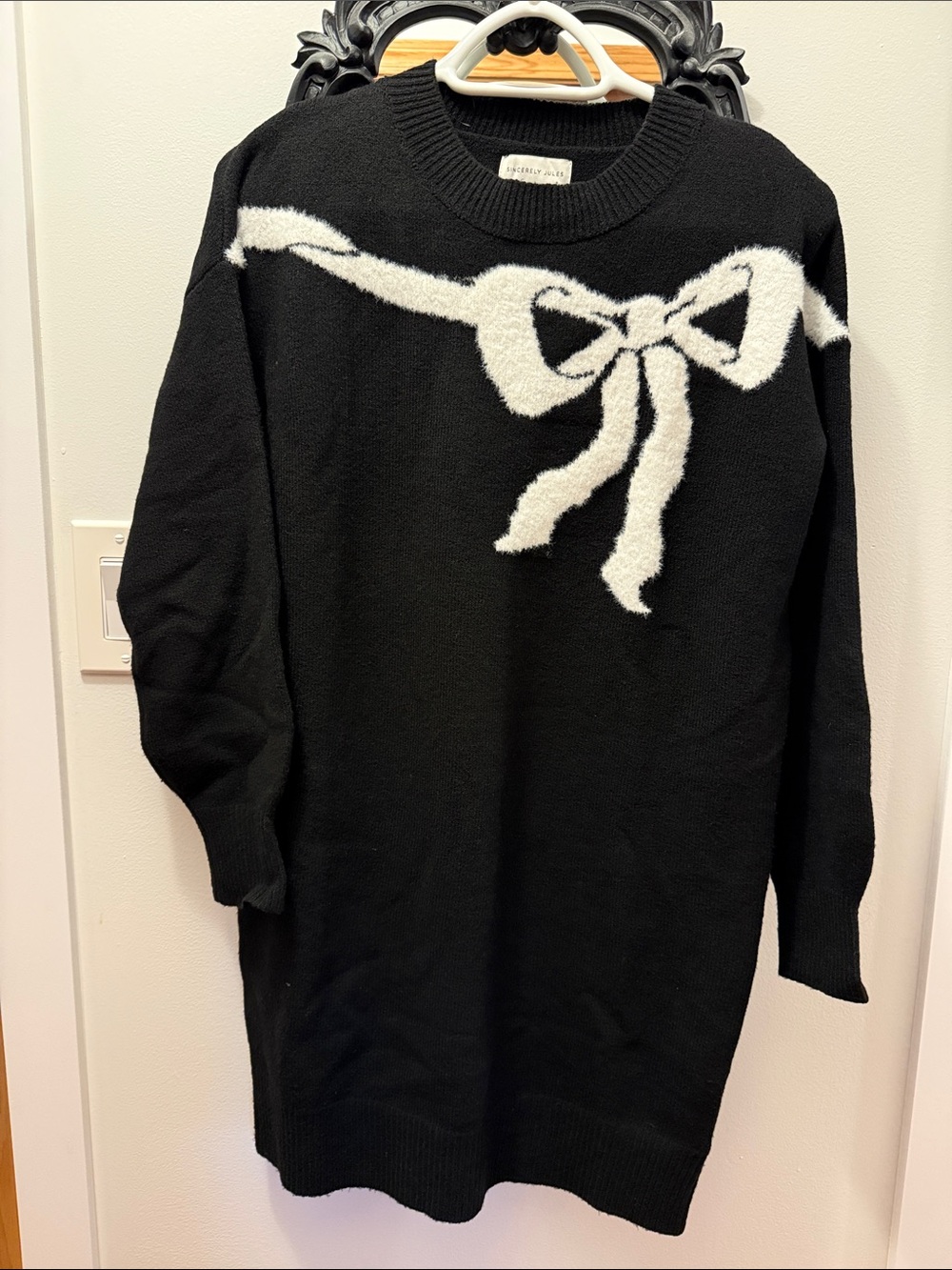 Sincerely Jules Black Sweater Dress with White Bow Detail